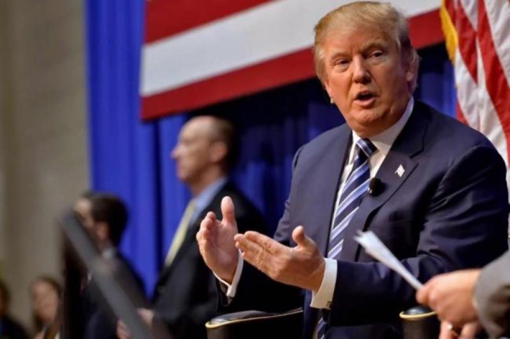 Trump takes a dig at 'fake news' media, says WH running smoothly Trump takes a dig at 'fake news' media, says WH running smoothly