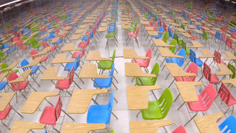 Mirrored classroom display highlights scale of massive education crisis Mirrored classroom display highlights scale of massive education crisis
