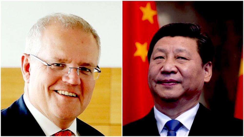Australia threatens to block China