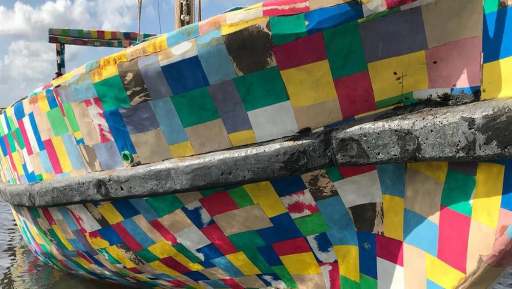 Boat made of recycled plastic and flip-flops inspires fight for cleaner seas along African coast