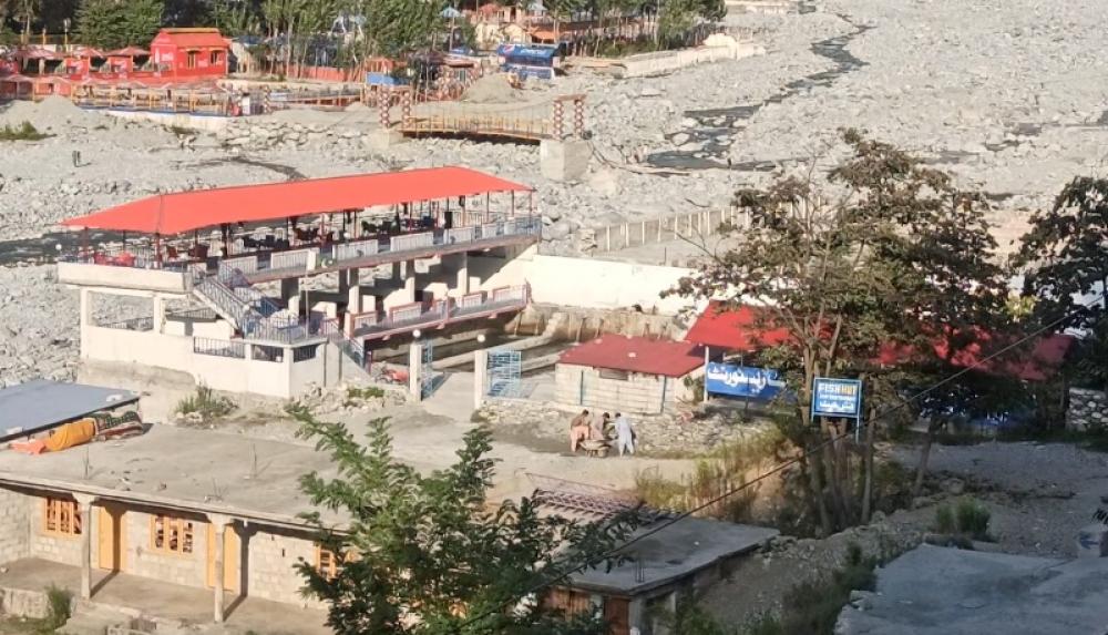 Hotels that were built flouting rules in the proximity of the river seen standing on the river bank after the flood waters abated