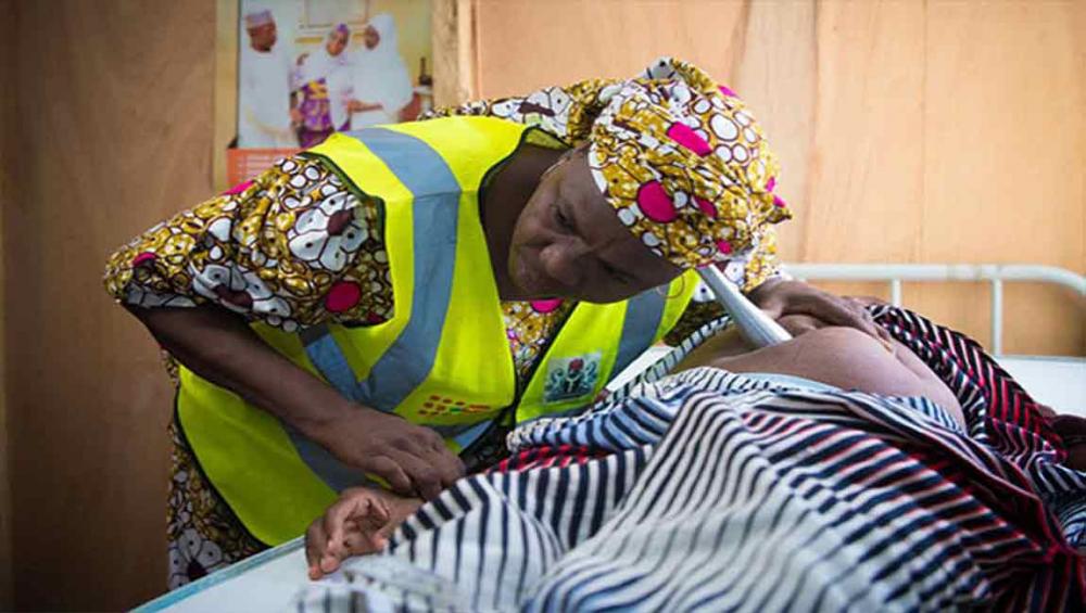 In conflict-affected Nigeria, UN agency teams with health workers to help the displaced