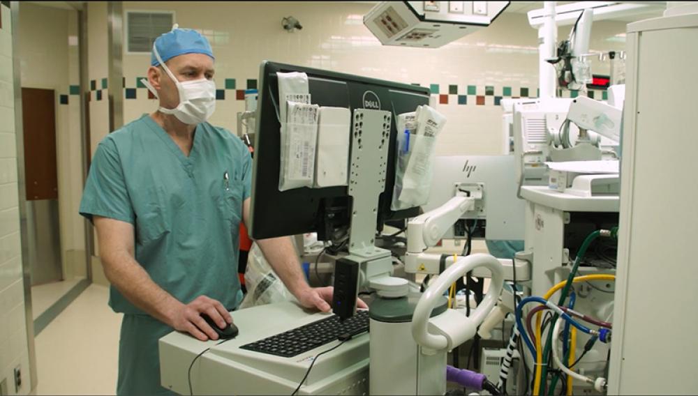 Doctor Jason Davis uses a computer program that assists in the robot assisted surgery he performs at Henry Ford Hospital in Detroit. Davis specializes in hip and joint replacements. Photos provided by Henry Ford Health Orthopedics.