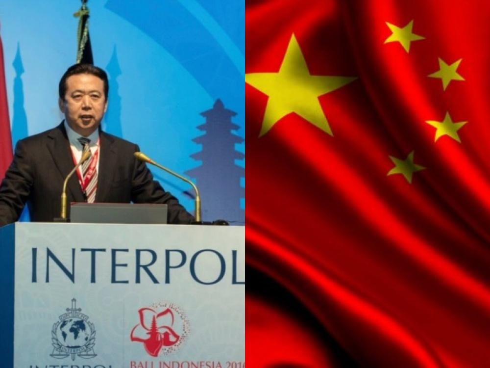 China confirms detaining missing Interpol chief