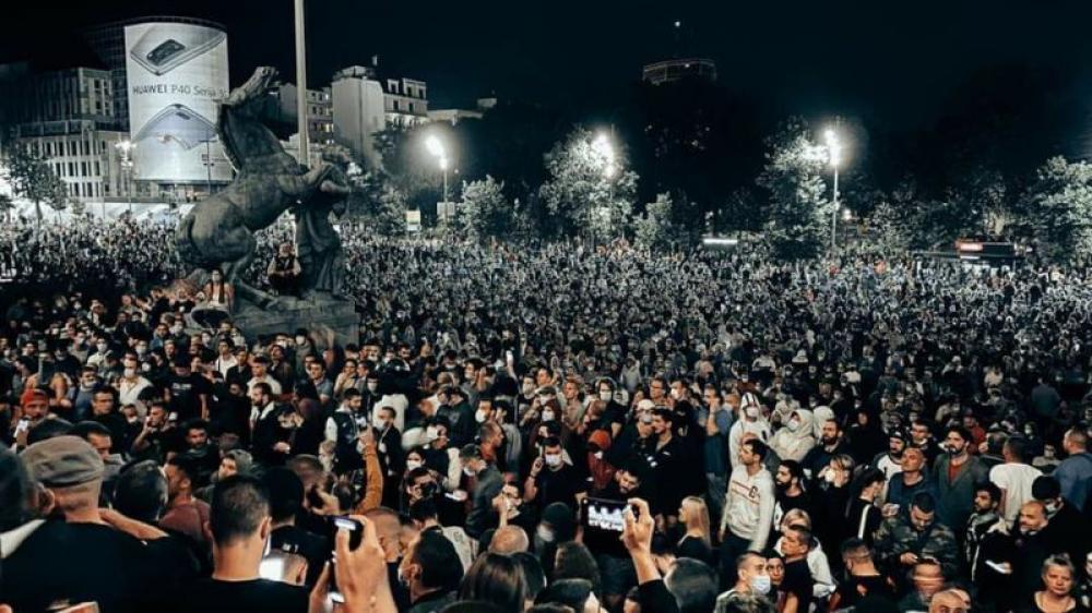 Protesters, police clash near Serbian Parliament over Covid-19 curfew 