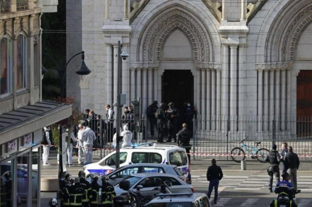 Knife-wielding man kills three inside Nice church, shouts 