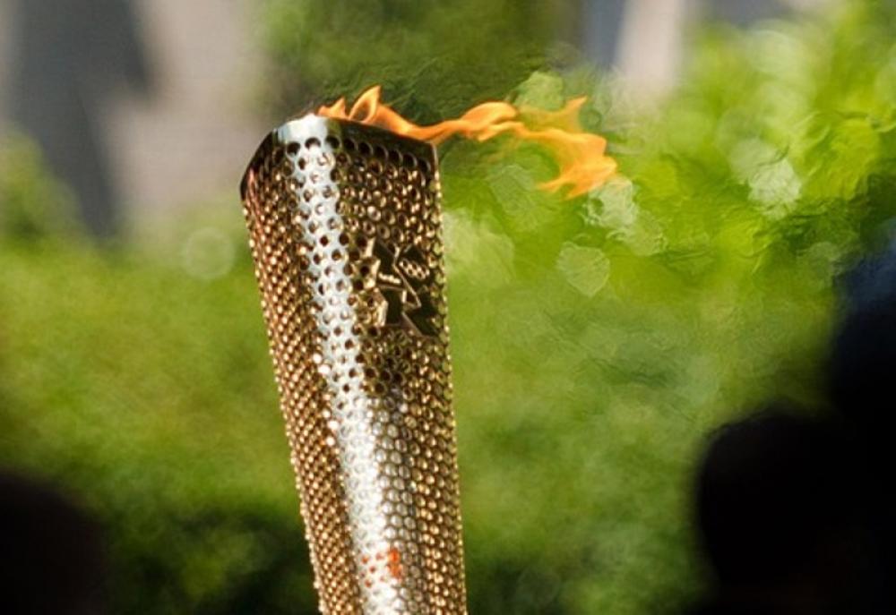 Olympic flame to be carried by car in Japan leg of torch relay