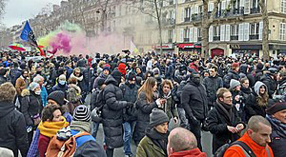 Paris police use batons to disperse pension reform protesters