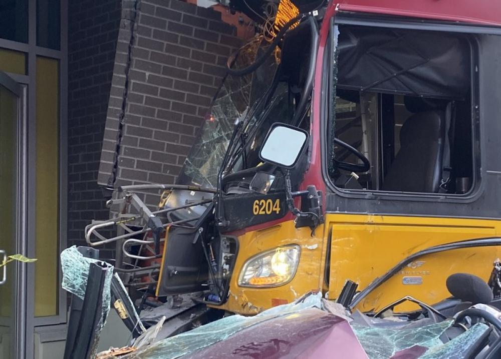 Woman pedestrian dies as bus crashes into building in Seattle