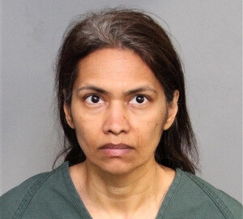USA: Mother arrested after she slits 11-year-old son's throat following Disneyland visit USA: Mother arrested after she slits 11-year-old son's throat following Disneyland visit