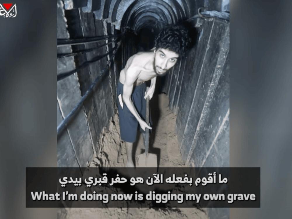 Starving Israeli hostage seen digging own grave in Hamas video, sparks global outrage Starving Israeli hostage seen digging own grave in Hamas video, sparks global outrage