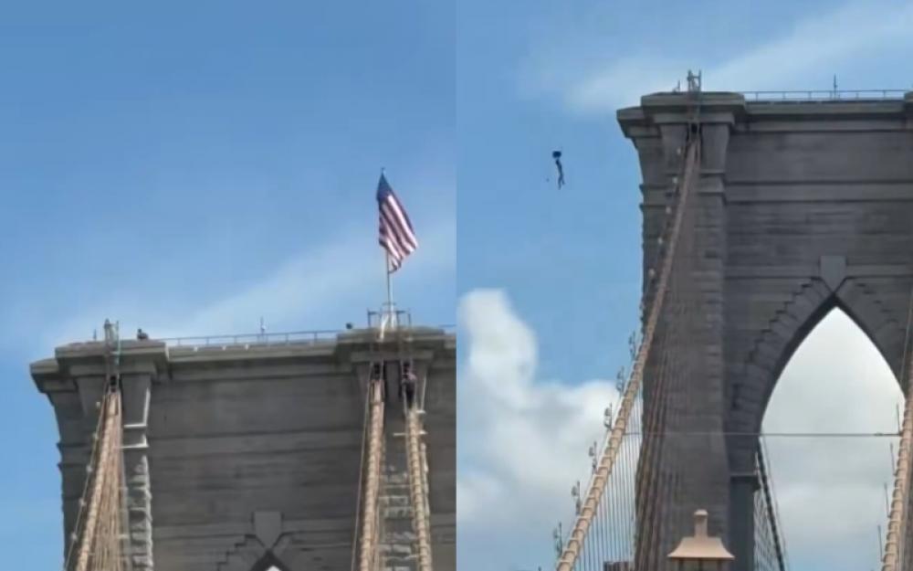 Viral video captures naked man's daring jump from New York's Brooklyn Bridge&mdash;He survives