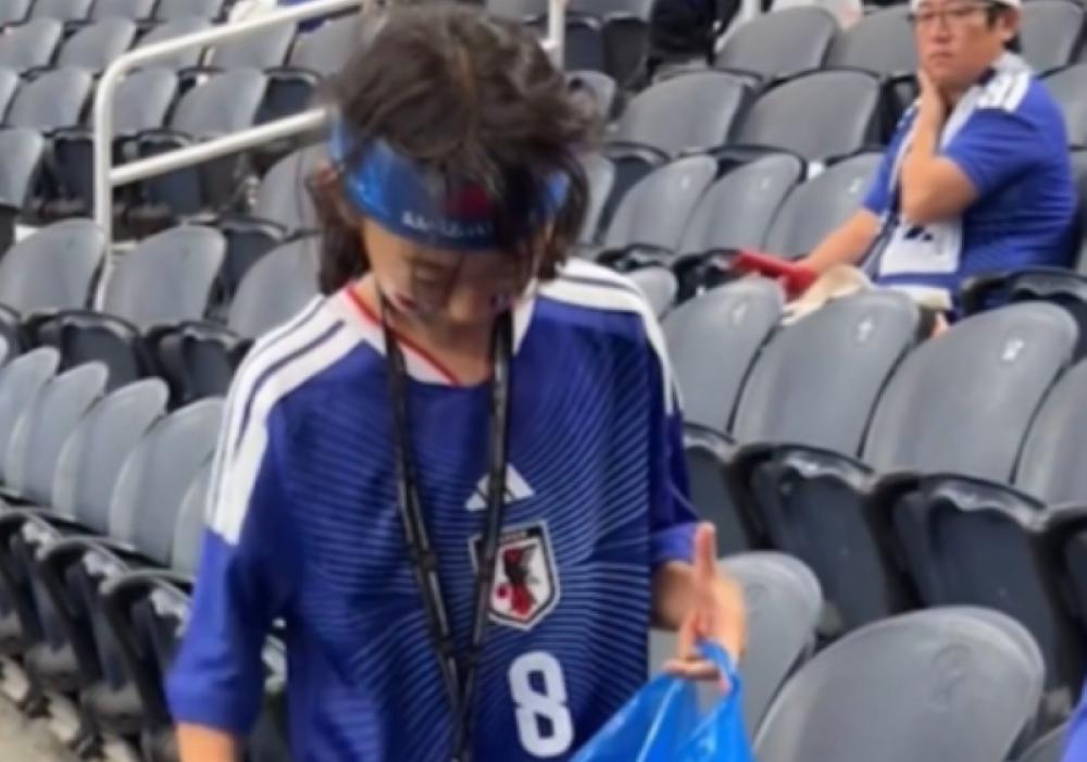  World Cup moment goes viral as Japanese supporters stay back to clean up stadium 