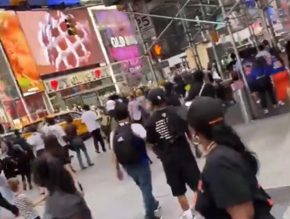 New York: Gunfire erupts in Times Square, sending tourists running as taken taken into custody 