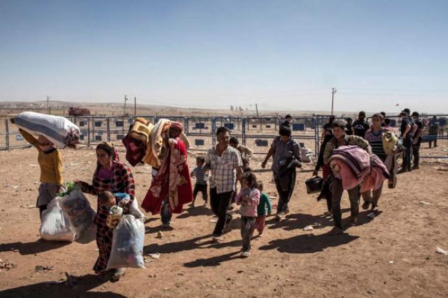 UN concerned over safety of civilians as ISIL intensifies offensive in Syrian border town