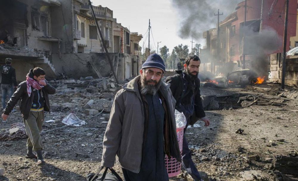 Mosul: UN rights chief urges civilian protection as sniper fire, airstrikes kill dozens