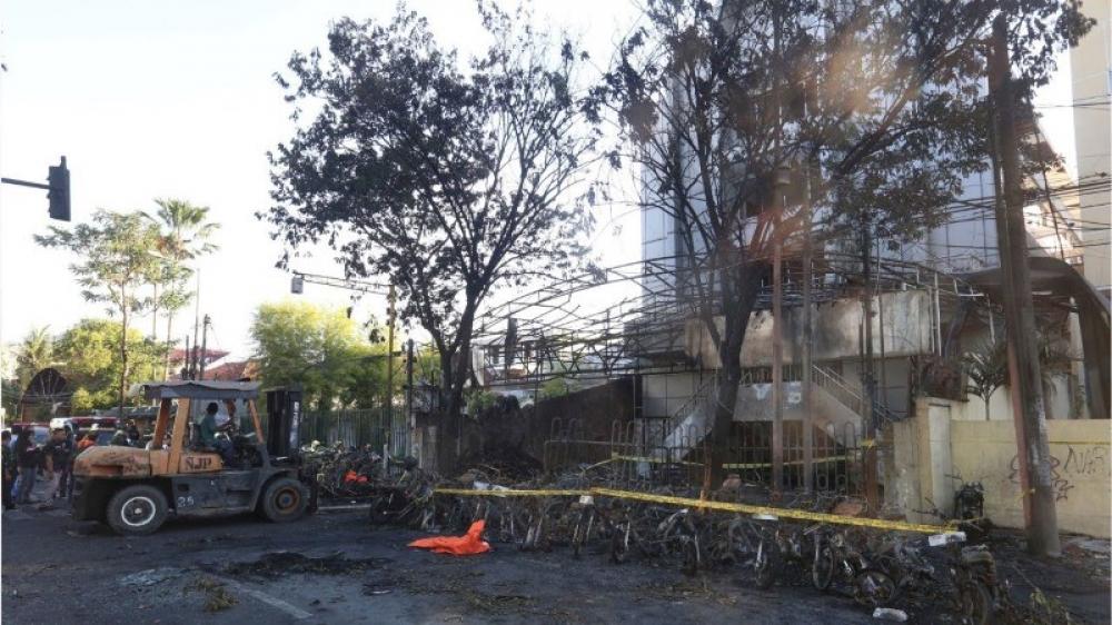 Indonesia church attacks: Police identify man and wife who orchestrated the Surabaya bombings