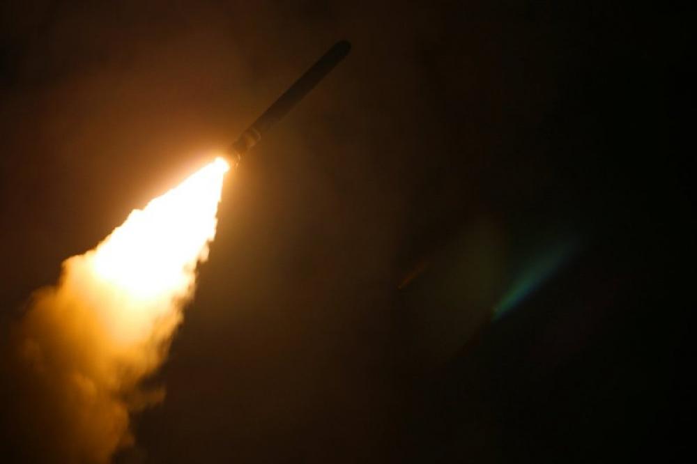 Syrian state media says foreign missiles shot down near airbase