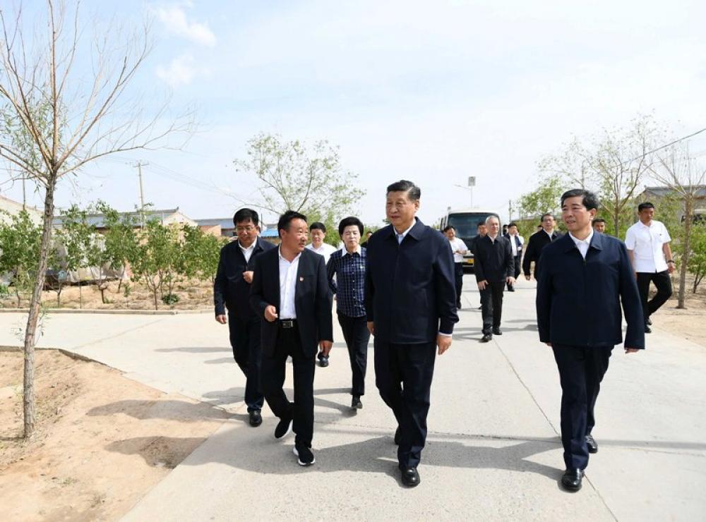 Xi Jinping learns about efforts to advance poverty alleviation in China