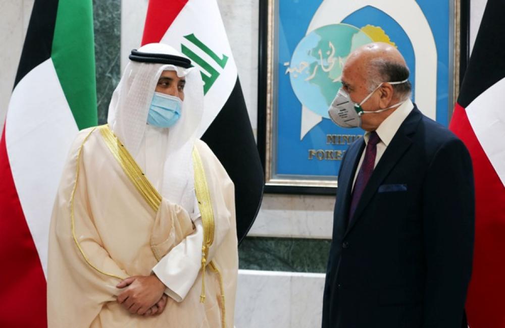 Iraqi Foreign Minister Fuad Mohammed Hussein meets Kuwaiti counterpart Sheikh Ahmad Nasser Al-Mohammad Al-Sabah