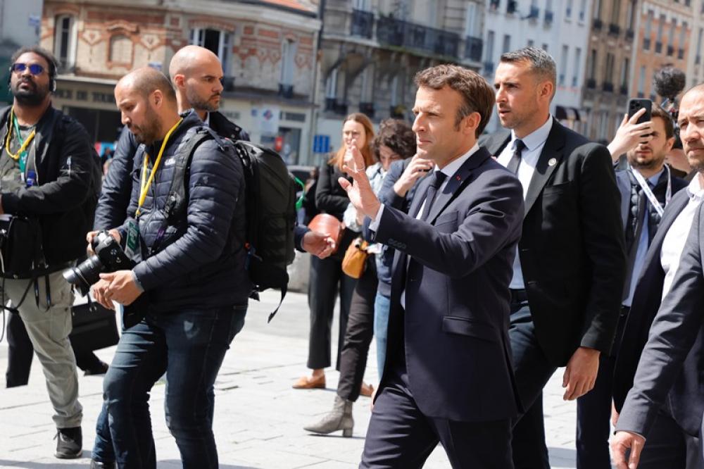 Emmanuel Macron greets crowd in Paris