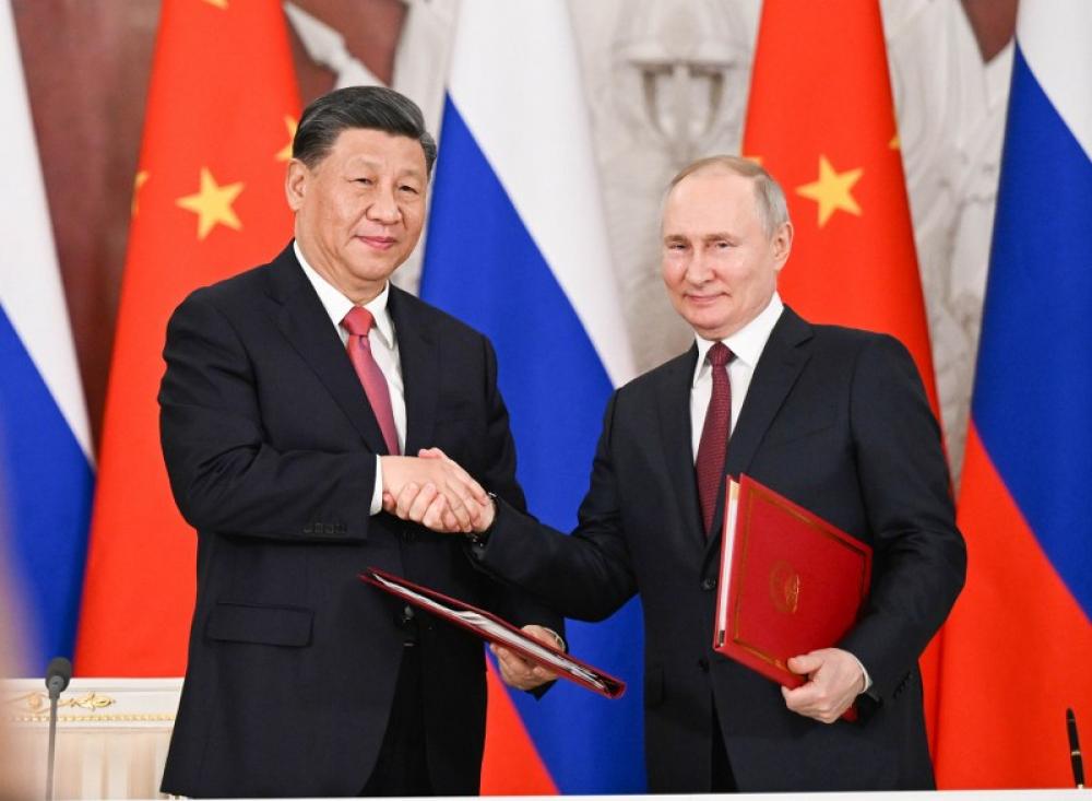 Xi Jinping, Putin in Russia