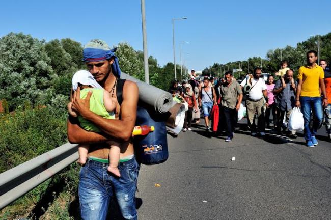Hungary urged to halt campaign portraying refugees and migrants as 