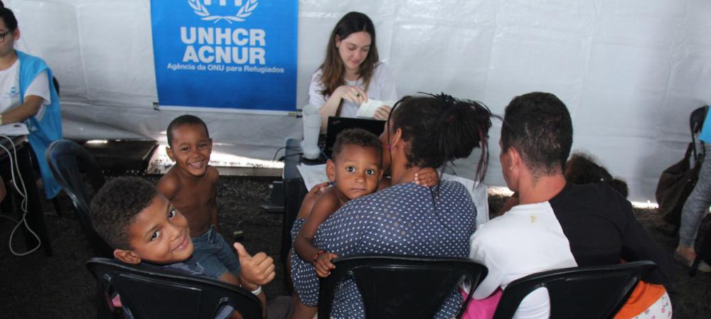 Key Brazilian border crossing for Venezuela refugees reopens as asylum numbers pass last year's total