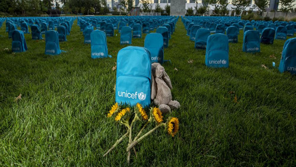 UNICEF backpacks used as a haunting symbol to call for greater protection of children living in conflict