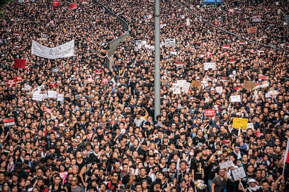 Hong Kong protesters attempt to storm local legislature : reports