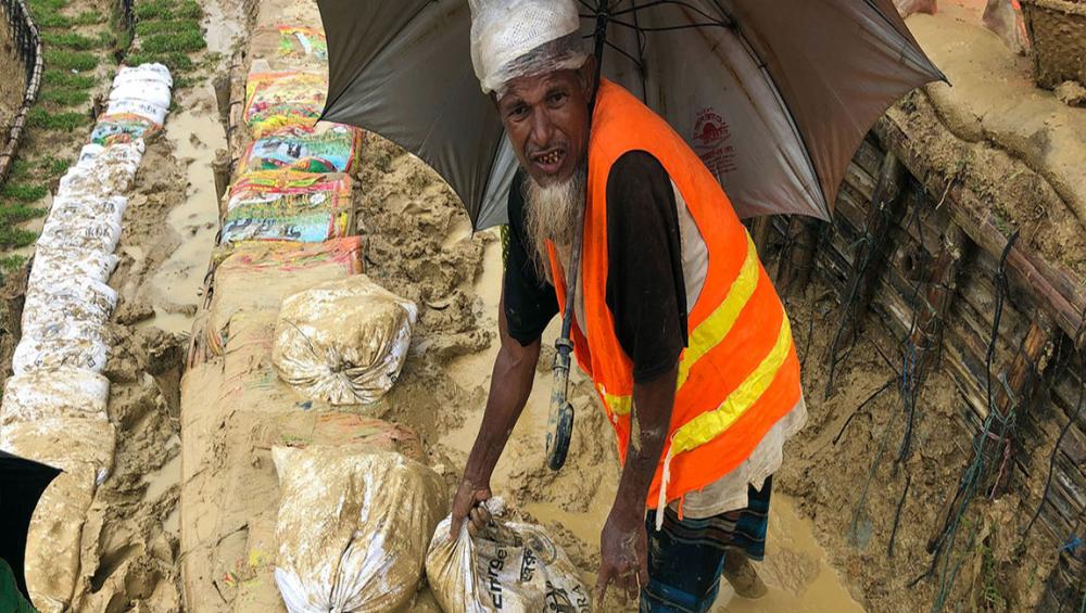 As monsoon rains pound Rohingya refugee camps, UN food relief agency steps up aid