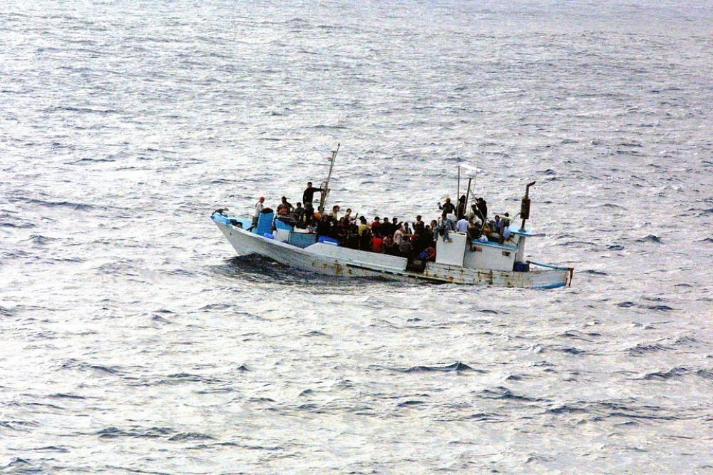 Vessel with 58 migrants reaches Italy