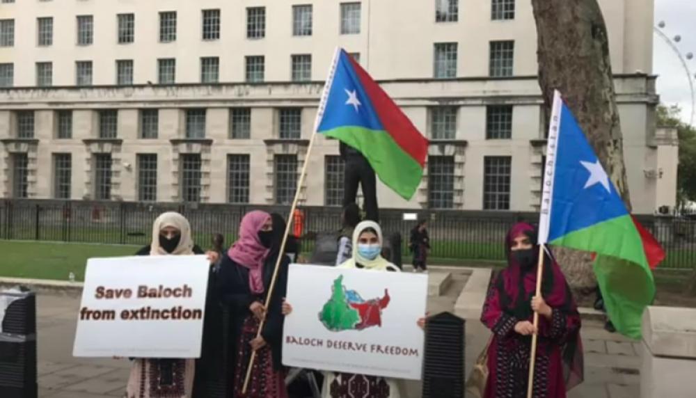 Protesters assemble in front of Boris Johnson