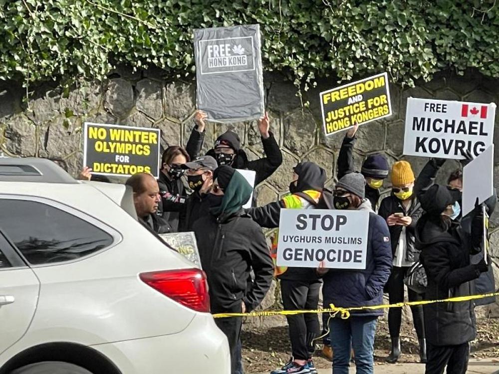 Demonstrators protest against Chinese treatment towards Hong Kongers, Tibetans and Uyghurs outside Vancouver Chinese Consulate