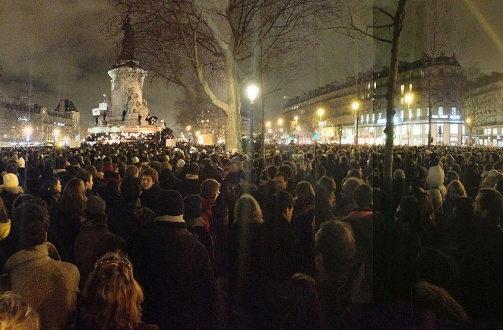 Demonstrators gather at the Place de la RÃ©publique in Paris on the night of the attack, Image by GodefroyParis /Creative Commons