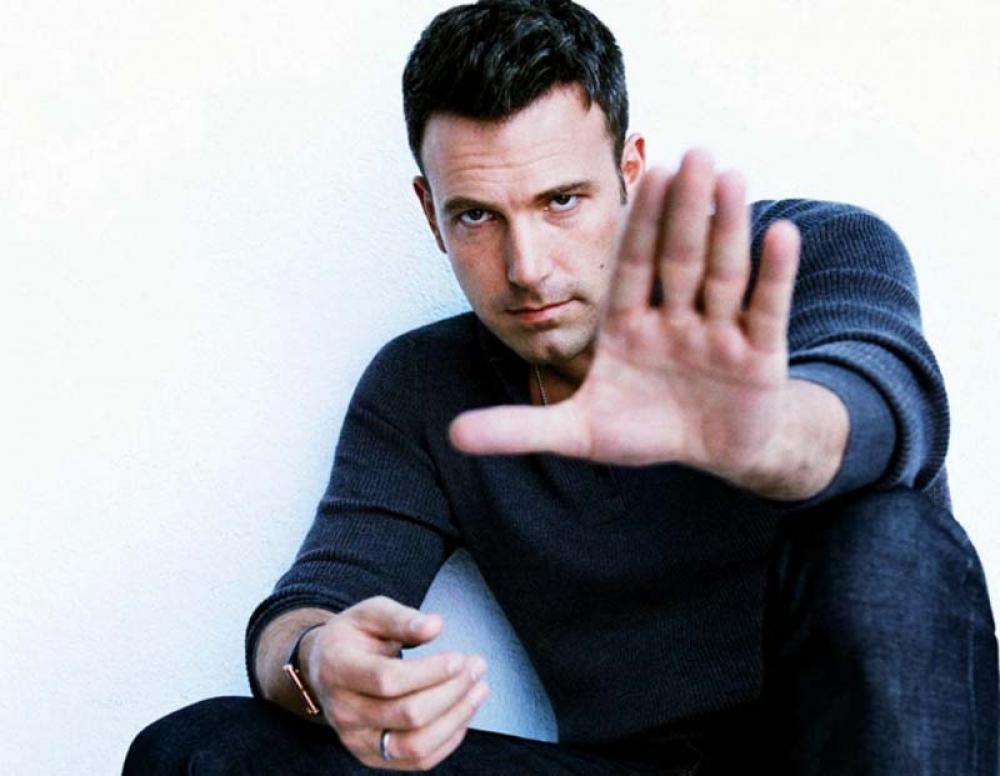 Hollywood actor Ben Affleck pushes man off of him at Venice airport