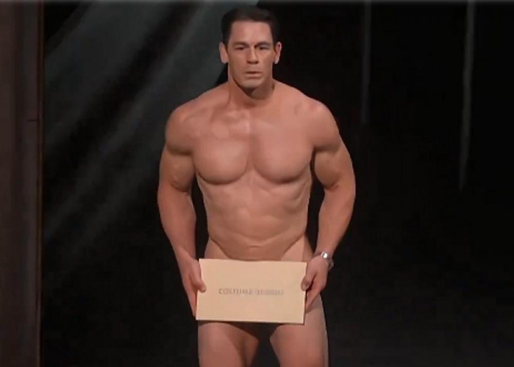 John Cena surprises all by appearing almost naked on stage to present Oscars award